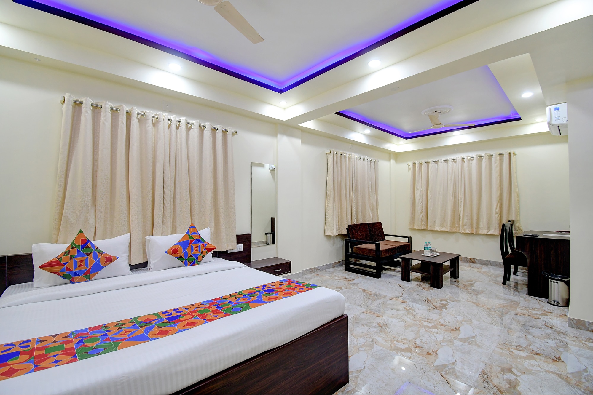 FabHotel Anchorage Inn - Nr. Axis Mall - Tap to explore photos