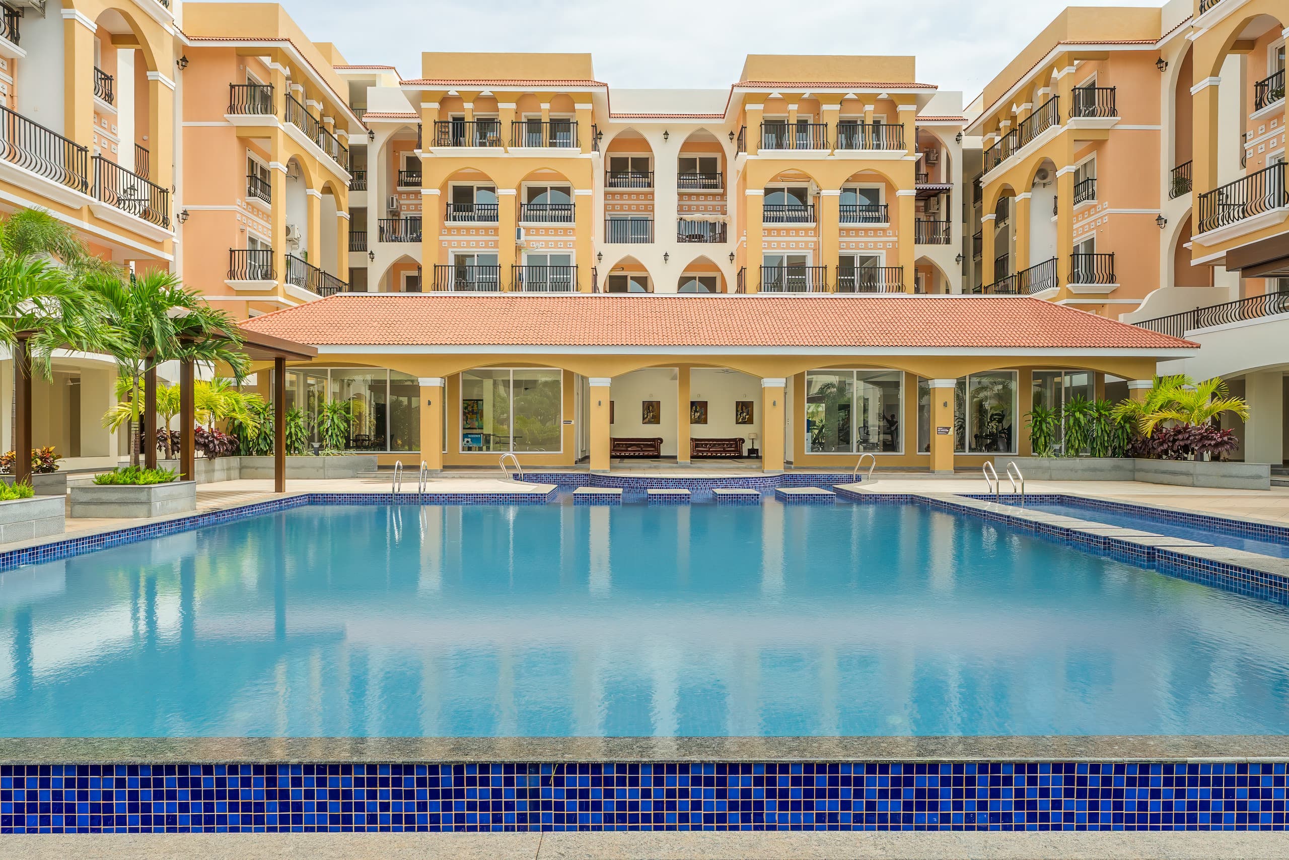 Sereno Olive modern 1bhk w pool gym games zone - Tap to explore photos