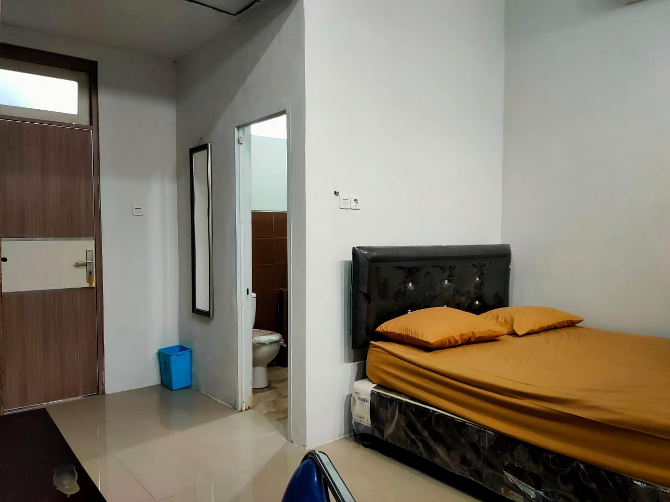 Hotel O Kost 3 Kelor Syariah - Tap to explore photos