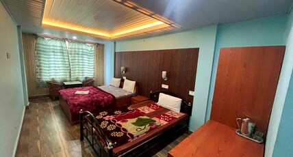 Hotel Little Hut - 550 mts from Mall Road Room Type - Cozy Family Room with City View (Sleeps Four)