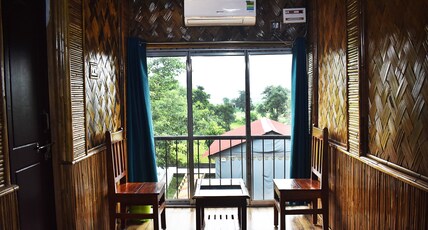 KALYAN LAKE RESORT Room Type - Double Bed First Floor AC - Bamboo Cottage KALYAN LAKE RESORT Room Type - Double Bed First Floor AC - Bamboo Cottage