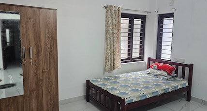 Gopurathingal Apartment Kakkand Room Type - Budget Double AC Room