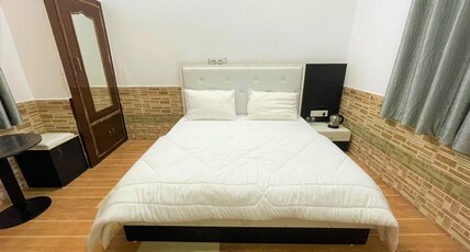 Lazy staytion Room Type - Deluxe King Non-AC Room