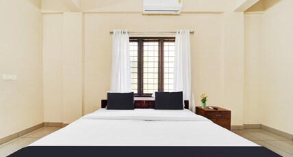 Hotel O Ambalamedu Puthenkurish Road Room Type - Classic