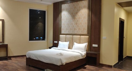 Tulip Tree Hotel Room Type - Executive Double Bed Room(Complimentary Railway Station or Helipad or Banganga Drop only))
