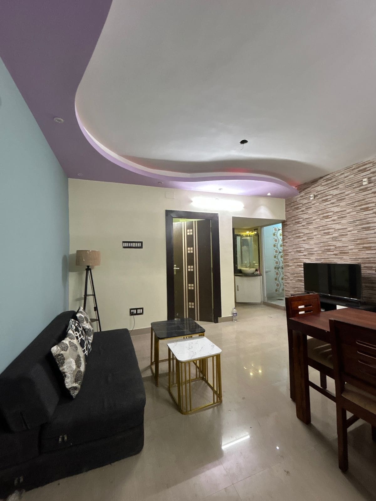 StayEasy Mahogany | Entire 3BHK Service Apt. - Tap to explore photos