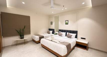 Vimalayatan Hotels and Marketing Room Type - Triple Suite Room with Balcony