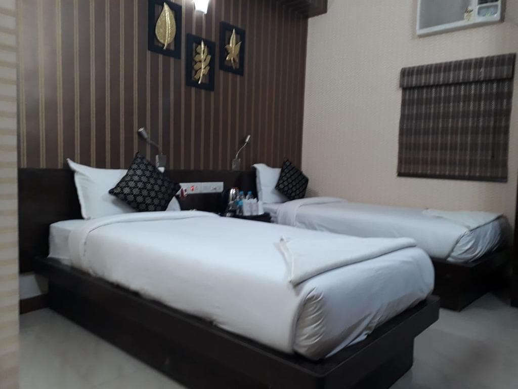 Hotel Tathagat Inn - Tap to explore photos