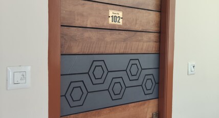 Giri's Residency Room Type - Bedroom 102