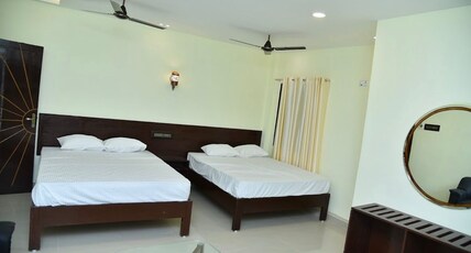 Alankar Lodge &Party hall Room Type - Family Non AC Suite Room