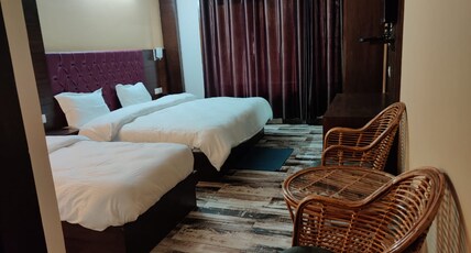 Suncrest by Macquary Inn Room Type - DELUXE TRIPLE ROOM,