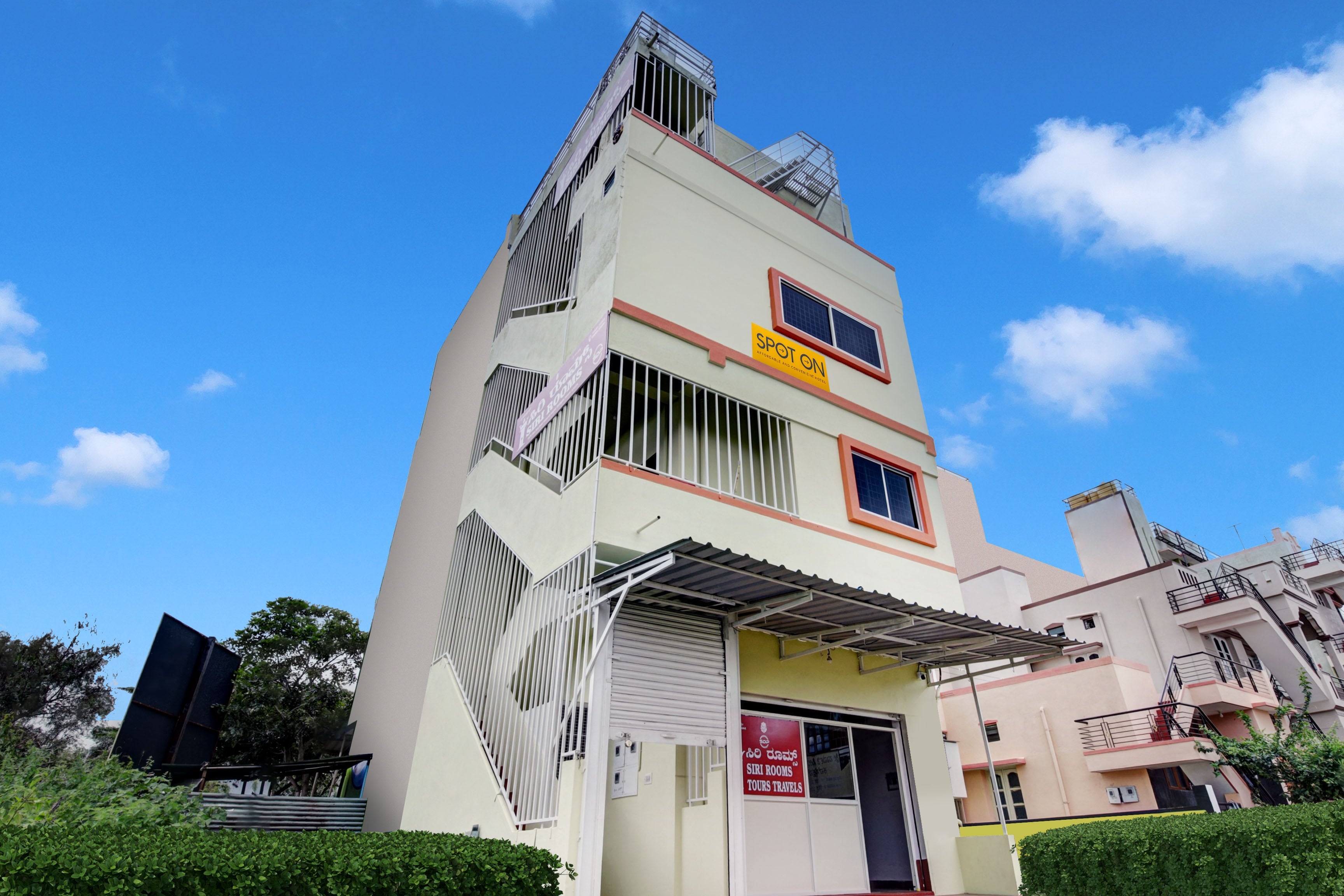 Hotel O ISIRI Rooms - Tap to explore photos