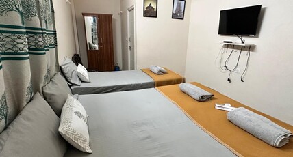 DHRUVANISH GRAND Room Type - Three Bed Standard room
