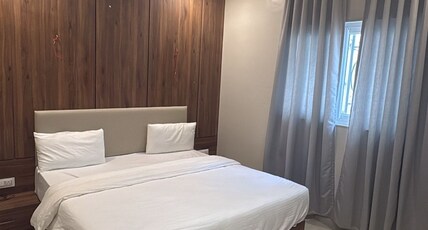 Radhakrishna Executive Lodge Room Type - Deluxe Double Room