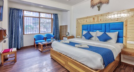 Hotel Naveen Room Type - Super Deluxe with Balcony Hotel Naveen Room Type - Super Deluxe with Balcony