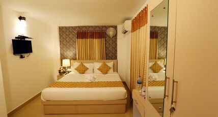 HOTEL SWARNA RESIDENCY Room Type - 3 Person Room AC Aditional price