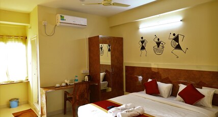Sasthi Suites Room Type - Deluxe AC
