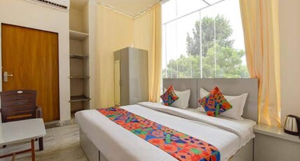 Purvi Stays Room Type - Bedroom Purvi Stays Room Type - Bedroom