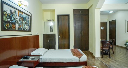 Enkay Residency V Block-Cyber City Room Type - Deluxe Twin Room with Balcony