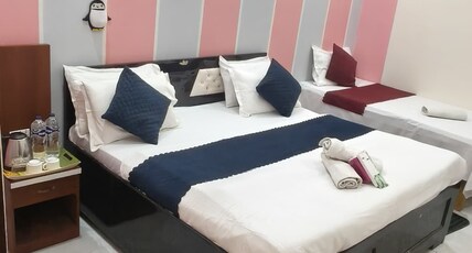 Rudra Prabha Guest House in front of Ram Mandir Gate Room Type - Triple Bedroom