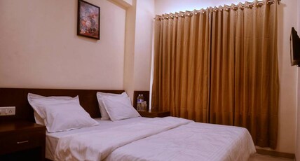 Malhar Grand Room Type - Deluxe AC Room