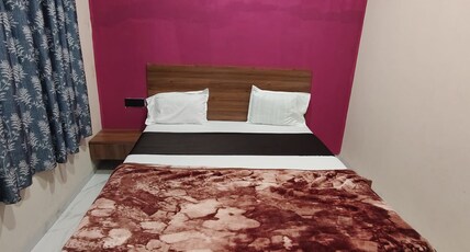 Gurukrupa Lodging Room Type - Deluxe Rooms