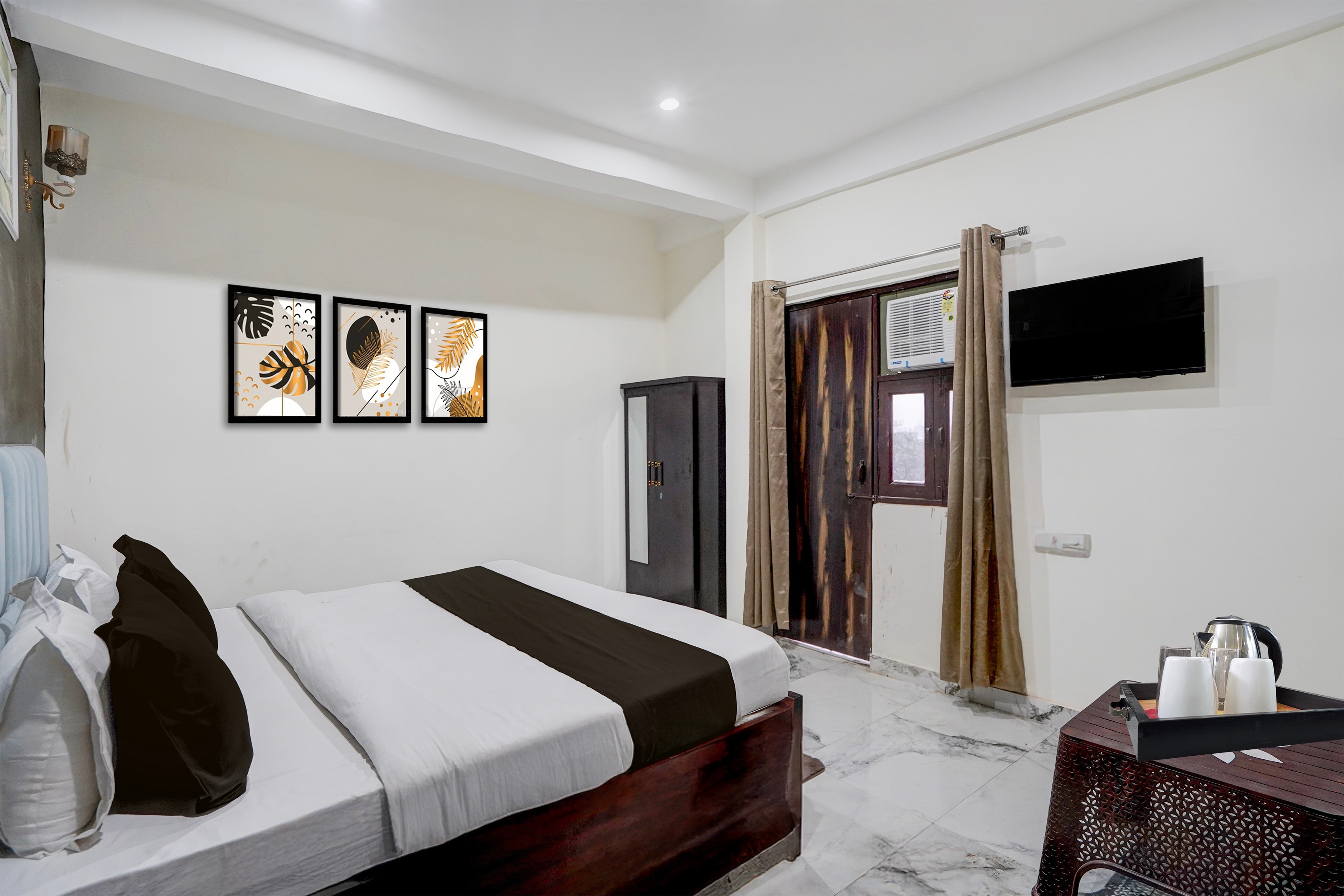 Hotel O Gaur City Centre Noida Formerly Dreamland Residency - Tap to explore photos
