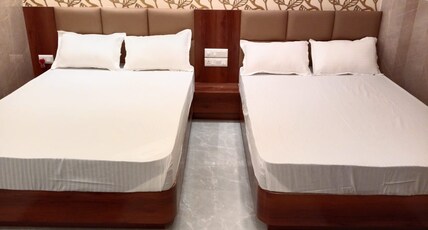 PP Palace Room Type - Deluxe AC with 2 Queen Beds