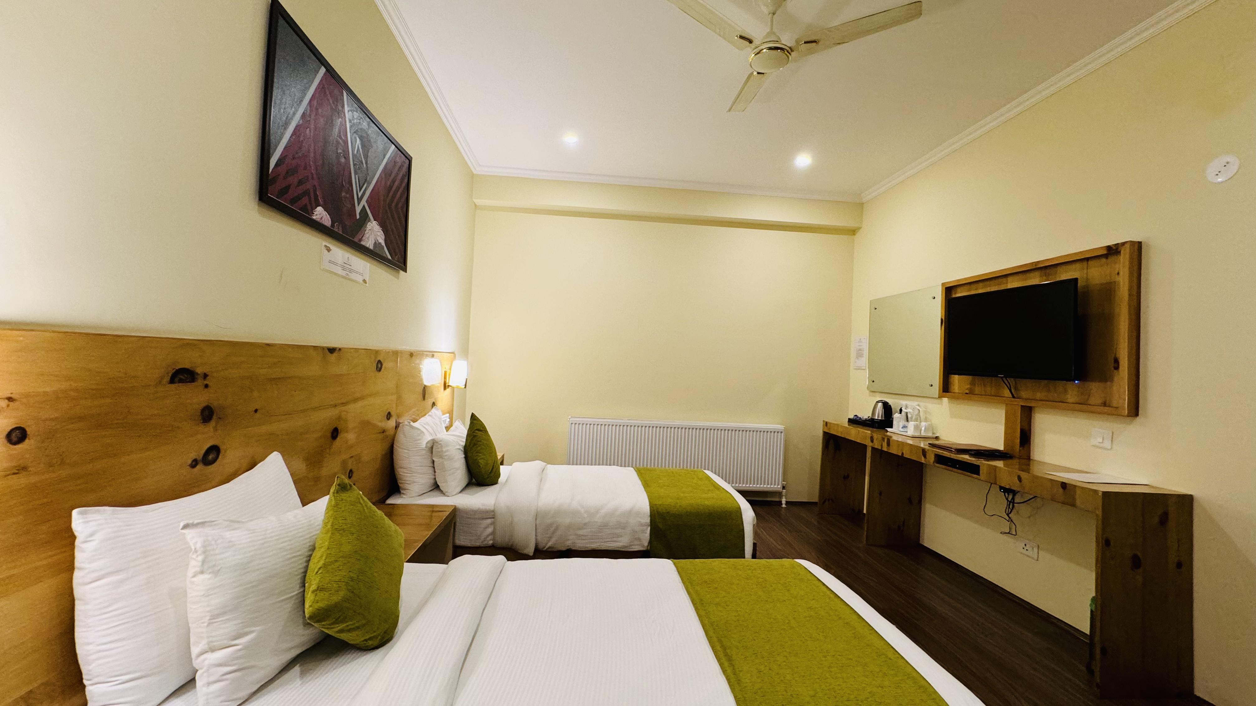 Hotel Crown Himalaya - Tap to explore photos