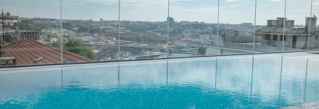 NH Porto Jardim Hotel - Tap to explore photos