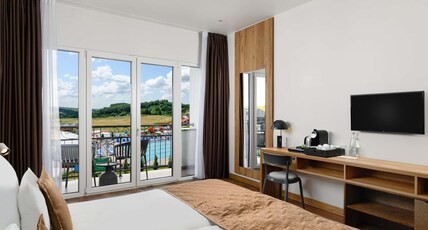 M Room Type - Standard Room with 2 beds, balcony and Pool View