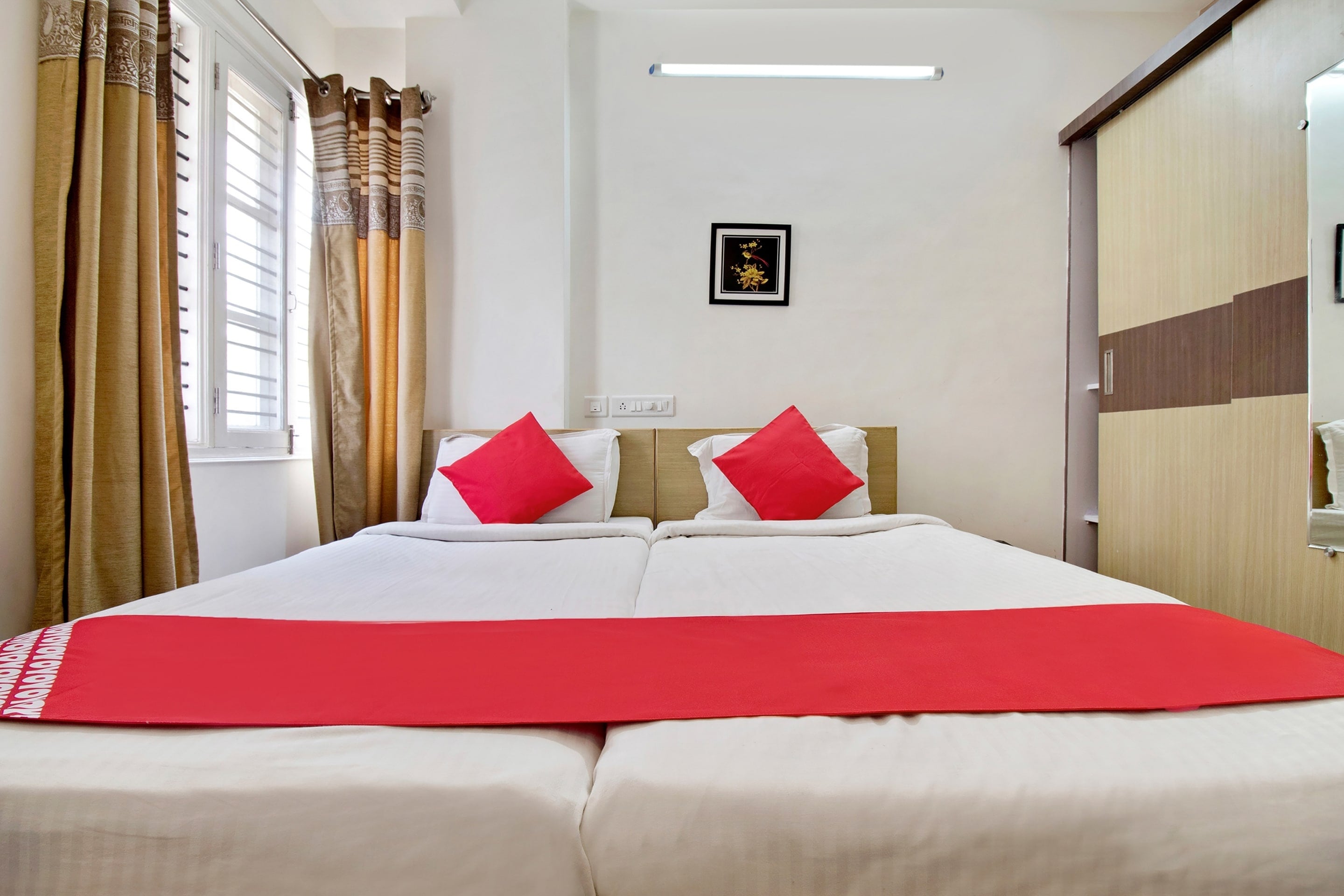Hotel O SLN Homes - Tap to explore photos