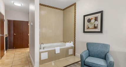 Best Western Plus JFK Inn & Suites Room Type - Suite-1 King Bed, Non-Smoking, Whirlpool, Microwave And Refrigerator, Flat Panel Television, Sofabed Best Western Plus JFK Inn & Suites Room Type - Suite-1 King Bed, Non-Smoking, Whirlpool, Microwave And Refrigerator, Flat Panel Television, Sofabed
