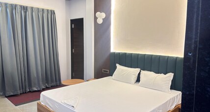 Hotel Prabhat Palace Room Type - Deluxe Room with Hill View King Bed Hotel Prabhat Palace Room Type - Deluxe Room with Hill View King Bed
