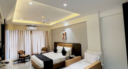 Hotel Sai Mahima Room Type - Deluxe Triple Bed