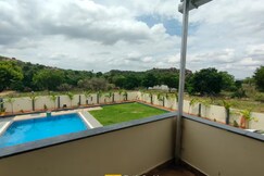 Serene Stay 4BHK FarmVilla | Pool | Lawn | BBQ | Events By AweNest