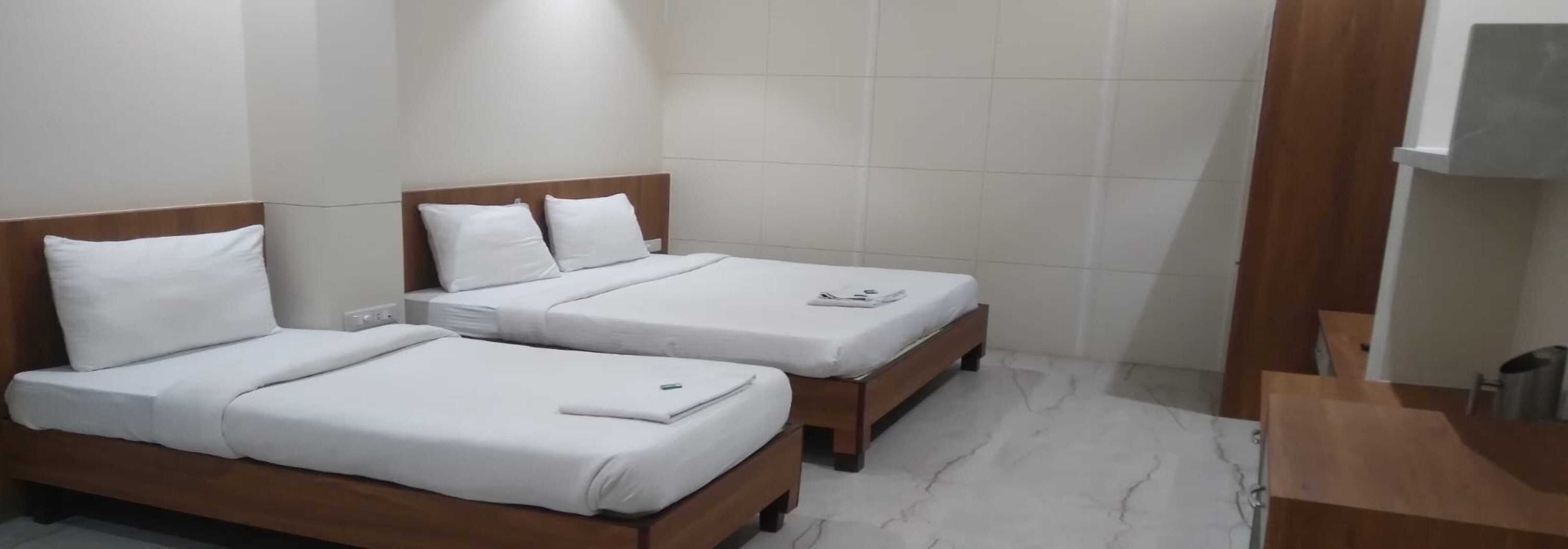 Hotel City Grand Opposite Varanasi Cantt Station - Tap to explore photos