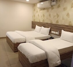 Serenity Inn Porur Room Type - Deluxe Triple Room