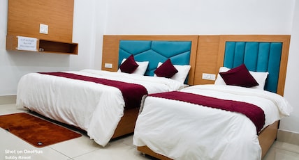 Hotel Kailasha Inn & Restaurant Room Type - Triple Bed Room with Hill View Hotel Kailasha Inn & Restaurant Room Type - Triple Bed Room with Hill View