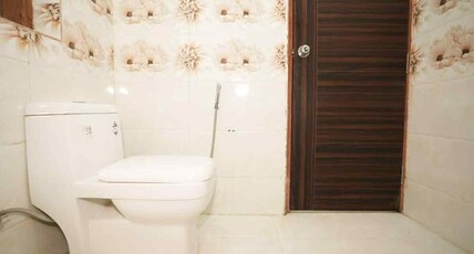 Tanvi Premium Residency near Artemis Hospital, Gurugram Room Type - Deluxe Twin Room with Balcony Tanvi Premium Residency near Artemis Hospital, Gurugram Room Type - Deluxe Twin Room with Balcony