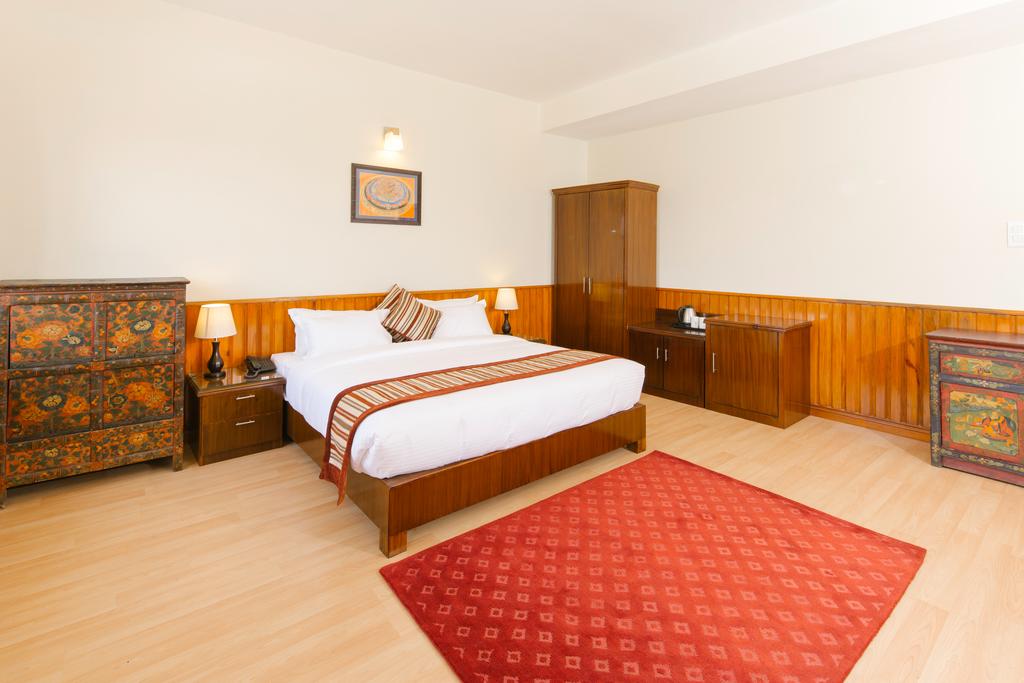 Hotel Mukhum International - Tap to explore photos