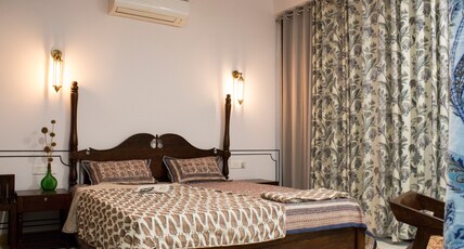 Jaisal Castle | Rooms in a Homestay Room Type - Bandhani with Private Sit out Area