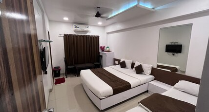 Hotel Anupama Room Type - deluxe room 3 bedded