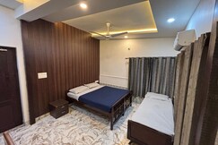 Calicut Greens | Cosy Rooms