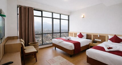 Drishya Hotel Room Type - Deluxe Twins Room with Mountain or City View - Free VIP 360 degree Restro lounge access & 10% off Drishya Hotel Room Type - Deluxe Twins Room with Mountain or City View - Free VIP 360 degree Restro lounge access & 10% off
