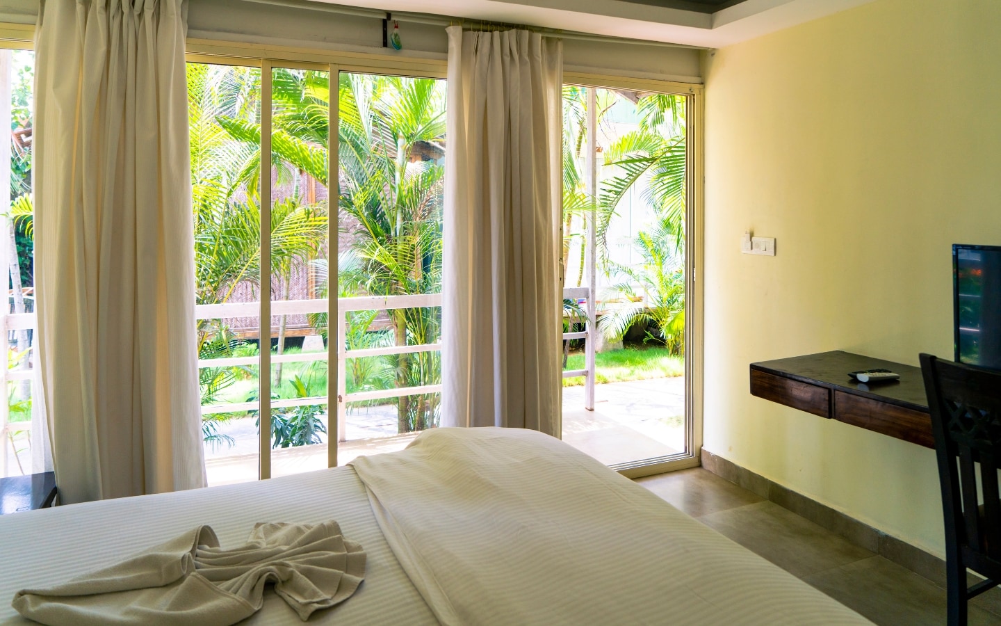 Village Susegat Beach Resort Goa - Tap to explore photos