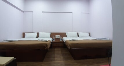 Rajhuns Deluxe Lodging Room Type - Four Bed AC