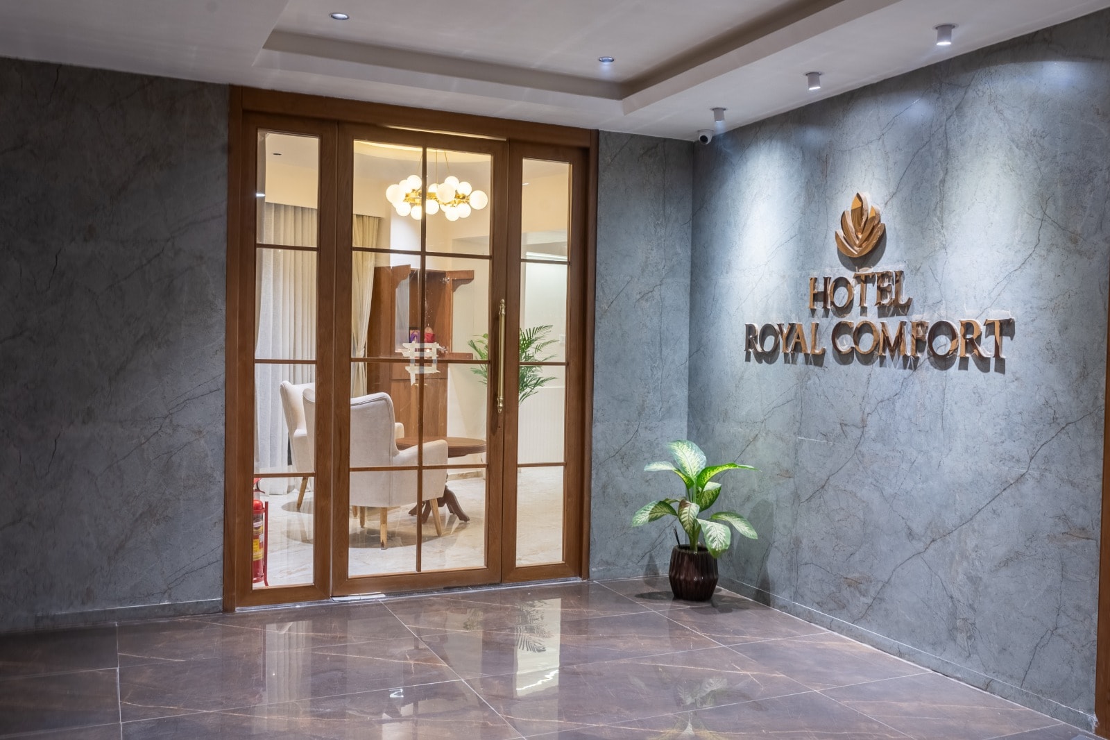 Hotel Royal Comfort - Tap to explore photos