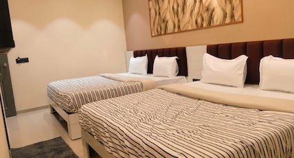 LALJI'S HOTEL & RESTAURANT Room Type - four bed room LALJI'S HOTEL & RESTAURANT Room Type - four bed room