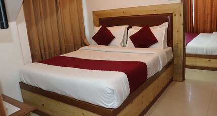 Hotel Tourist Home by Palak Hospitality Room Type - Family room
